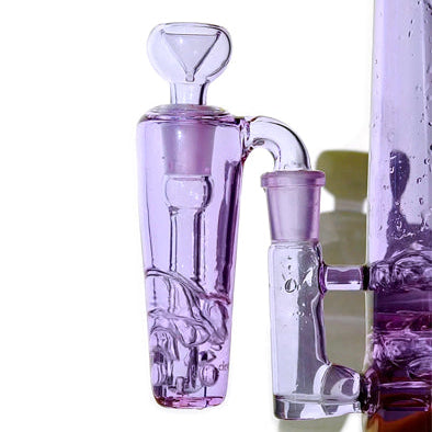 Purple glass ash catcher with water bubbling inside, picturing a demo of functionality (without smoke)