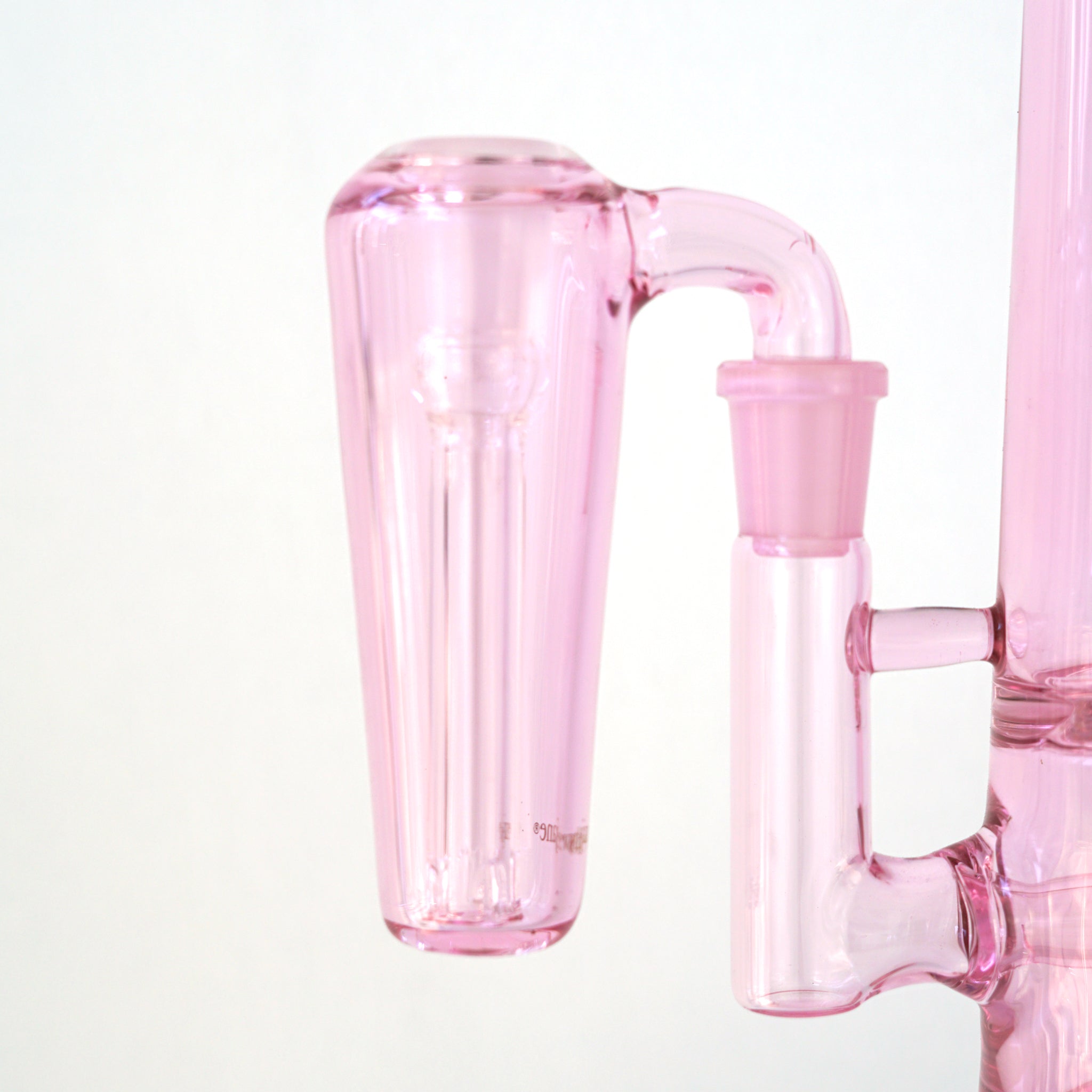 Close up of conical pink glass ash catcher, fit on a 90 degree joint bong