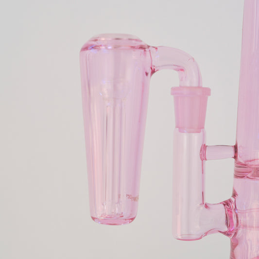 Close up of conical pink glass ash catcher, fit on a 90 degree joint bong