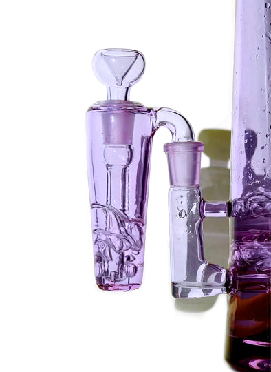 Purple glass ash catcher with water bubbling inside, picturing a demo of functionality (without smoke)