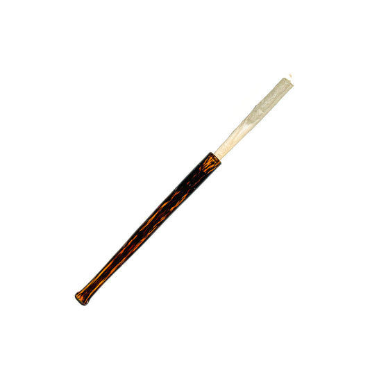 Cruella joint holder made of mixed borosilicate glass in a tortoise shell pattern using amber and black glass