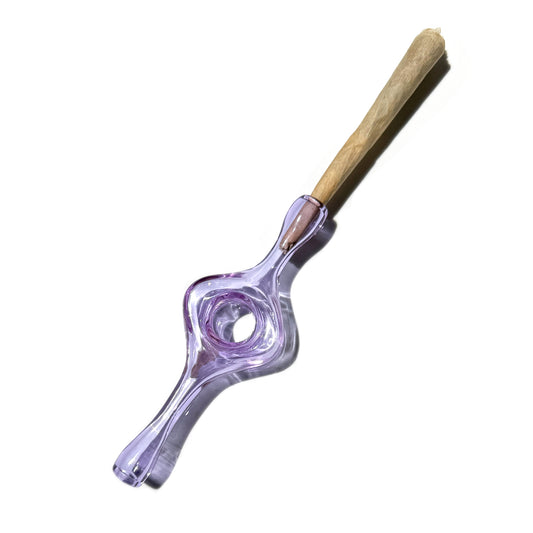 A purple glass joint holder with a hole in the middle designed for better grip and a smoother smoke. 