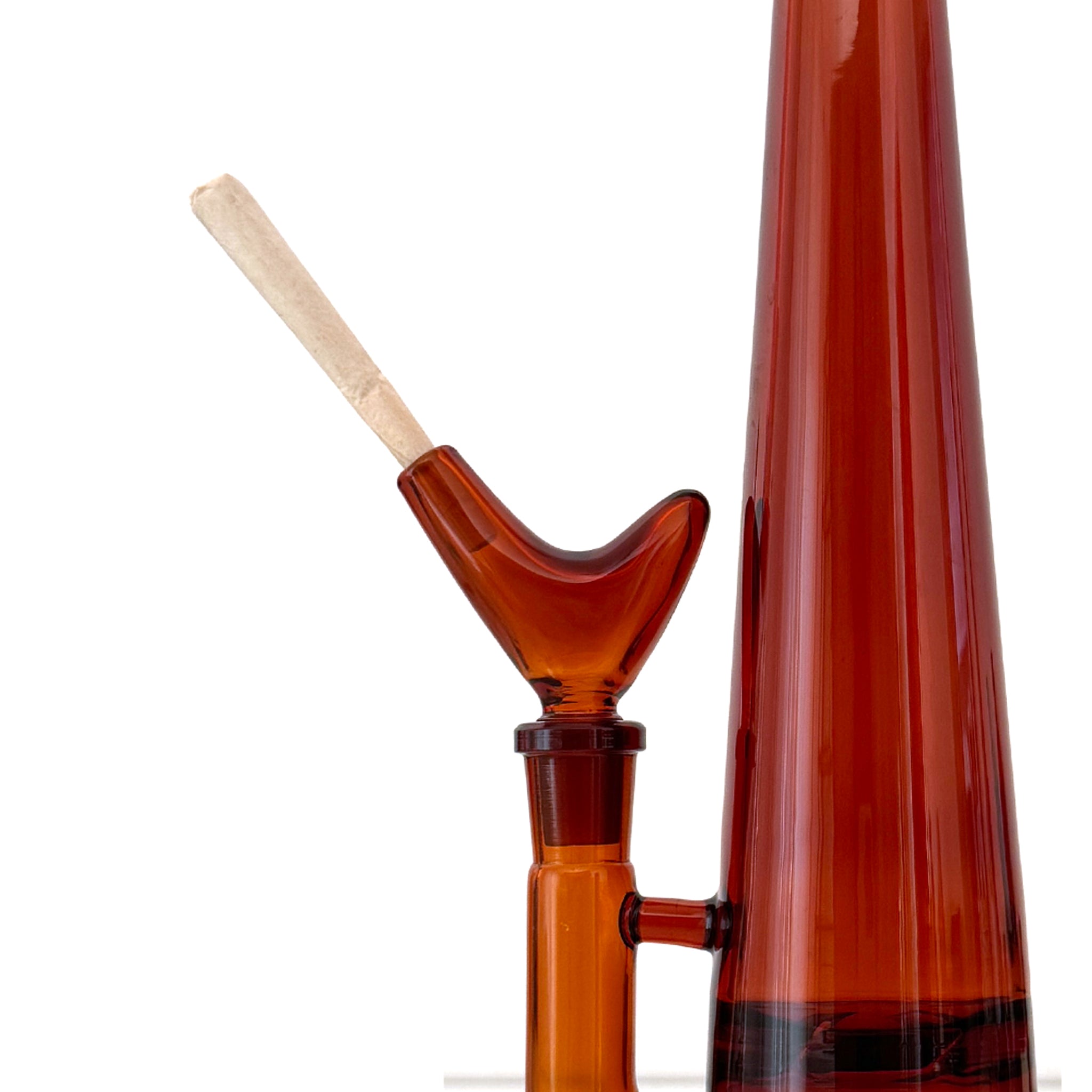 Amber glass bowl for bong with an opening that fits a joint. The bowl is reminiscent of an abstract bird shape